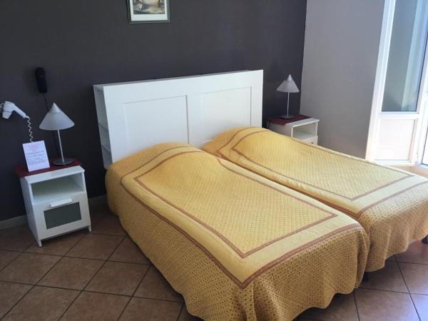 L'ilot Fleuri : photo 2 de la chambre chambre lits jumeaux - vue sur mer