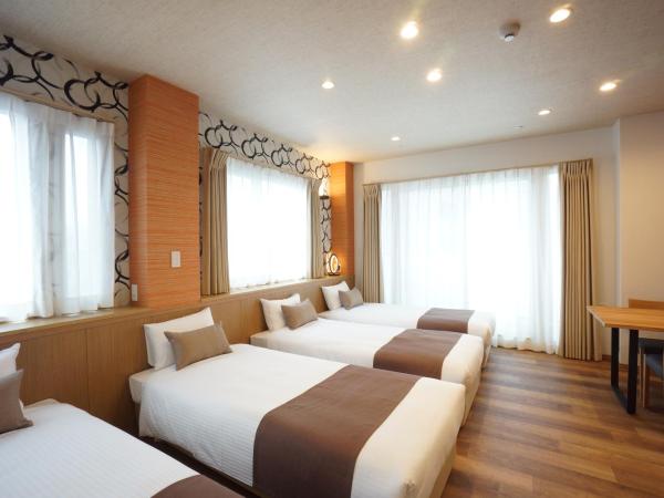 WIRES HOTEL James zaka : photo 4 de la chambre chambre quadruple