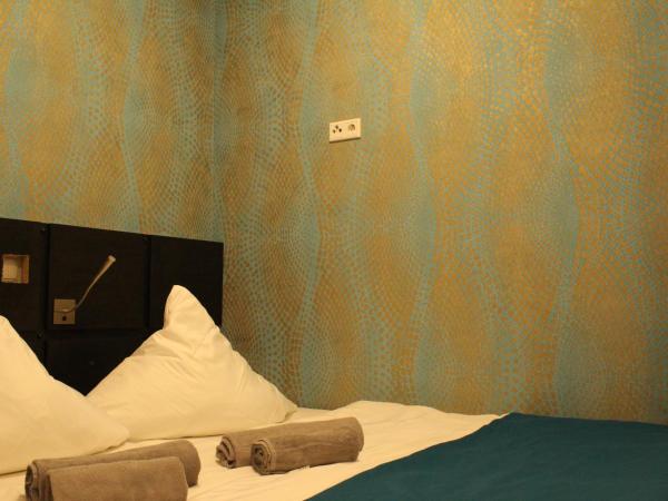 Lovely Studio Cologne West - Neues Momomotel : photo 4 de la chambre chambre double