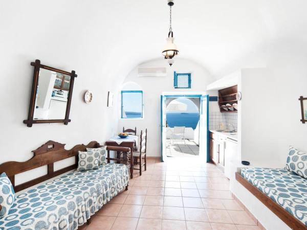 Nikos Villas : photo 1 de la chambre appartement supérieur avec vue sur la caldeira