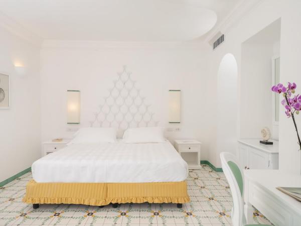 Sina Flora : photo 1 de la chambre chambre lit queen-size