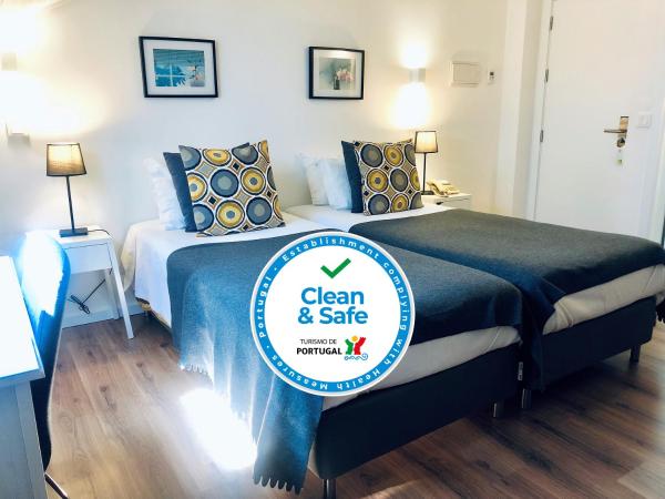 Hotel Botanico de Coimbra : photo 3 de la chambre chambre double ou lits jumeaux