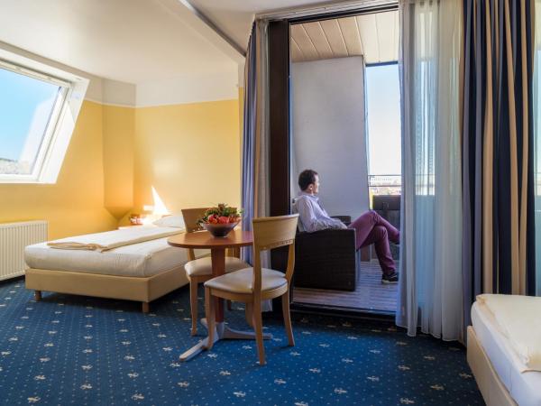 Aparthotel Astro - Nichtraucherhotel : photo 2 de la chambre chambre quadruple