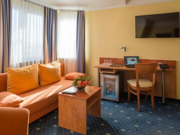 Aparthotel Astro - Nichtraucherhotel : photo 3 de la chambre chambre quadruple