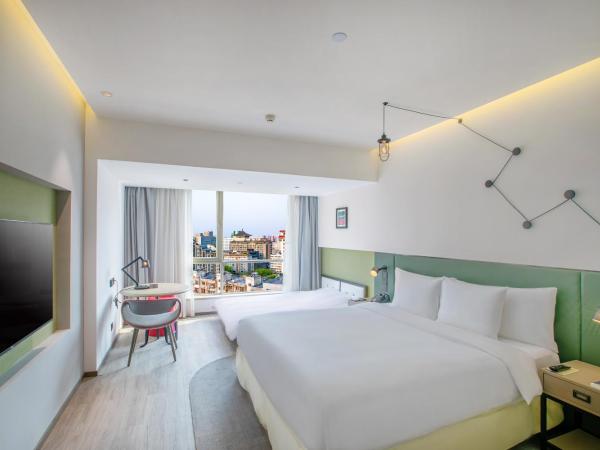 Jinmao Hotel Xi'an Downtown ( Bell & Drum Tower) : photo 3 de la chambre chambre familiale deluxe