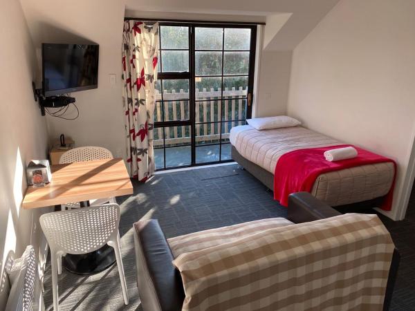 Southern Comfort Motel : photo 8 de la chambre appartement 1 chambre (lits double, jumeaux ou triple)