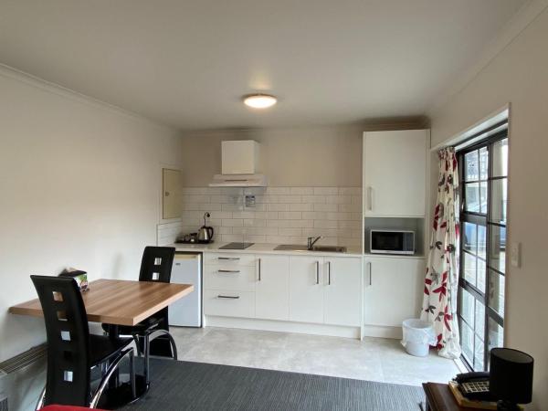 Southern Comfort Motel : photo 6 de la chambre studio supérieur avec baignoire spa