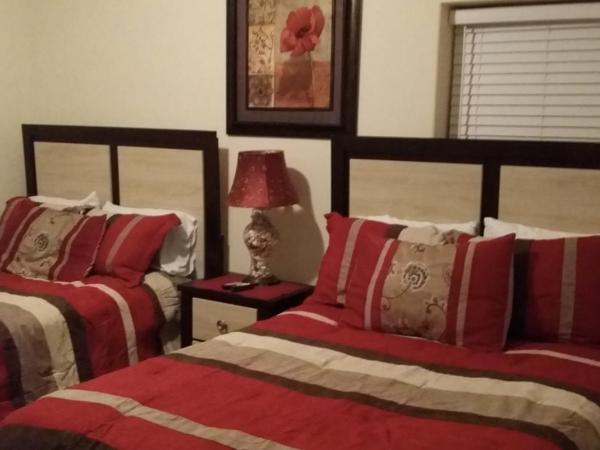 Tropic Winds Condo : photo 6 de la chambre appartement avec balcon