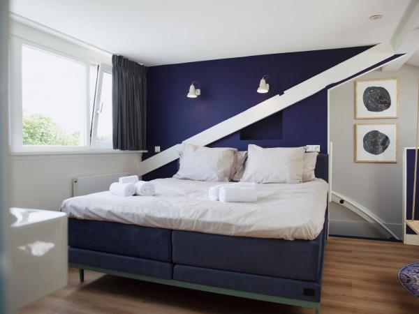 MUZE Hotel Utrecht : photo 1 de la chambre chambre triple - vue sur ville