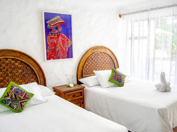 Petit Hotel Pilitas : photo 2 de la chambre suite quadruple