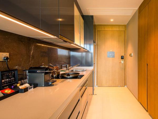 Oakwood Apartments Sanya : photo 6 de la chambre studio – vue sur jardin