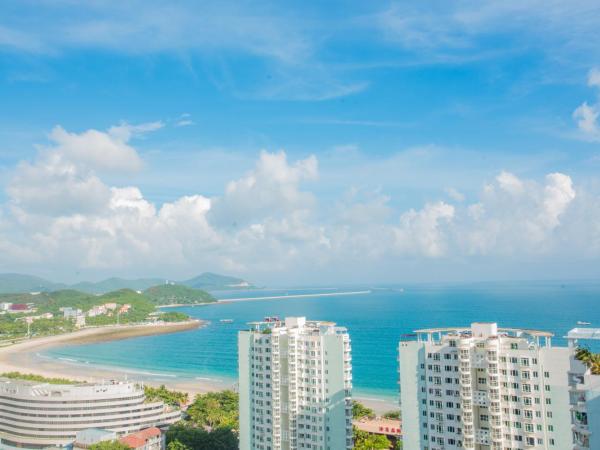 Sanya Sun and Sea Gueshouse : photo 7 de la chambre chambre lits jumeaux - vue latérale sur mer