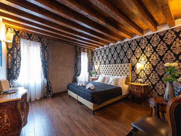 Domus Superior : photo 1 de la chambre chambre triple supérieure avec vue sur le canal