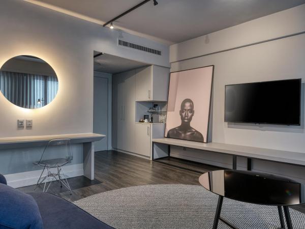 Caesar Business Belo Horizonte Belvedere : photo 1 de la chambre suite exécutive - un lit double