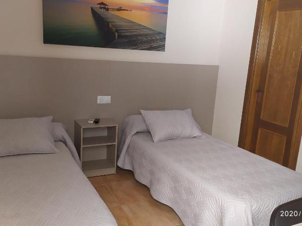 Las Rosas : photo 8 de la chambre chambre lits jumeaux avec salle de bains privative