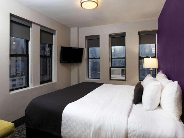 La Quinta by Wyndham New York City Central Park : photo 4 de la chambre chambre lit queen-size - non-fumeurs