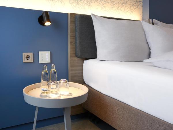 H4 Hotel Leipzig : photo 5 de la chambre chambre double ou lits jumeaux confort 