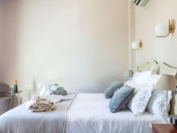 Hôtel Le Maxime - Best Western Signature Collection : photo 1 de la chambre chambre lit king-size de luxe - vue sur rivière - non-fumeurs