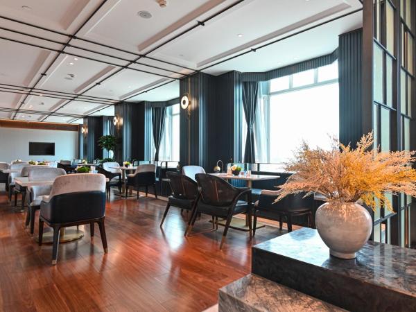 Wyndham Qingdao : photo 10 de la chambre elegant family suite with 2 king bed rooms