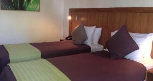 Ramada By Wyndham Cairns City Centre : photo 1 de la chambre room #4979111