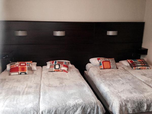 Hôtel des Ambassadeurs : photo 6 de la chambre chambre quadruple