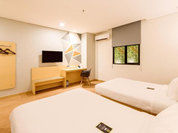 Juno Jatinegara Jakarta : photo 2 de la chambre chambre lits jumeaux deluxe