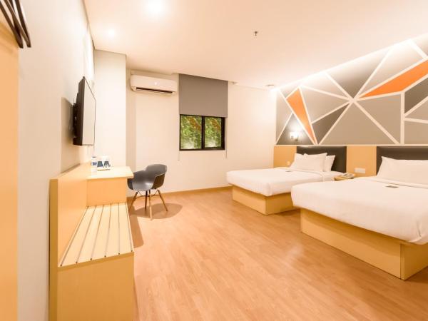 Juno Jatinegara Jakarta : photo 3 de la chambre chambre lits jumeaux deluxe