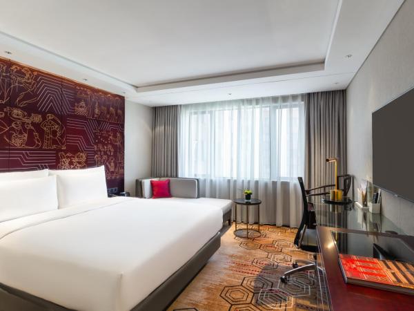 China Hotel Guangzhou-Free Shuttle Bus to Canton Fair Complex : photo 6 de la chambre chambre lit king-size ou lits jumeaux deluxe