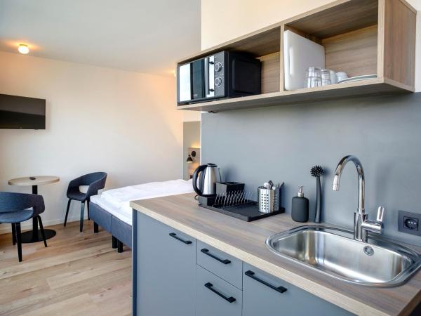 Go Hotel City Apartments : photo 4 de la chambre appartement (2 adultes)