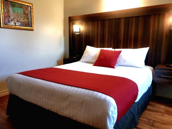 Hotel et Motel Le Chateauguay : photo 1 de la chambre chambre supérieure lit queen-size