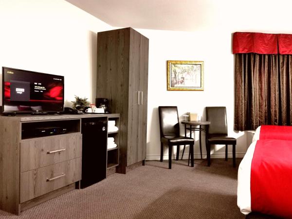 Hotel et Motel Le Chateauguay : photo 3 de la chambre chambre double supérieure avec deux lits doubles