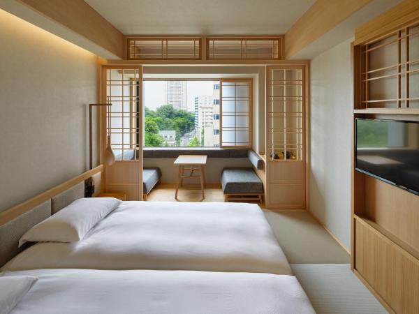 ONSEN RYOKAN Yuen Sapporo : photo 1 de la chambre chambre lits jumeaux hollywood avec douche - non-fumeurs