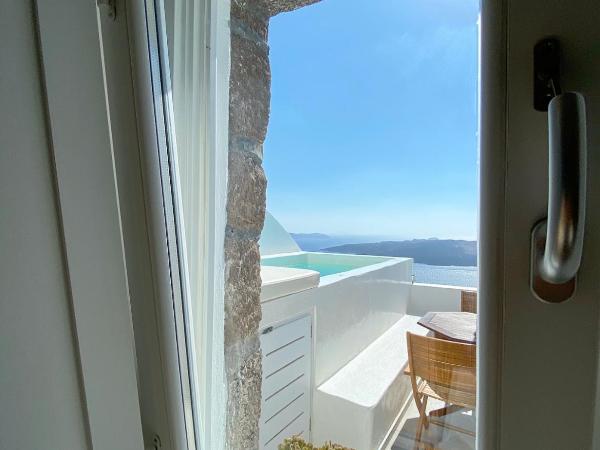 Panorama Suites : photo 2 de la chambre villa avec jacuzzi extérieur - vue sur caldeira