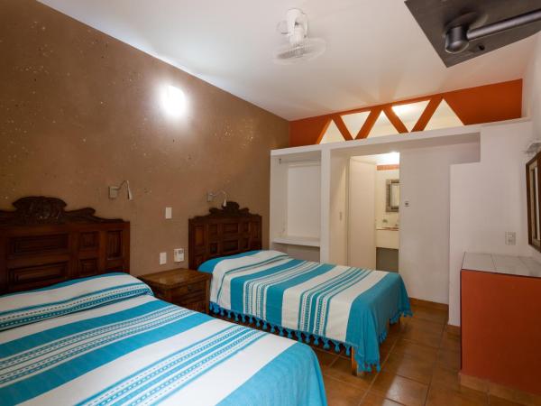 Hotel Hortencia : photo 1 de la chambre chambre deluxe avec 2 lits doubles