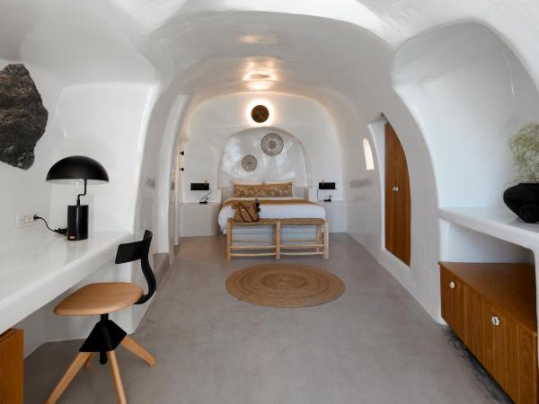 Filotera Suites : photo 1 de la chambre suite troglodyte avec jacuzzi extérieur chauffé privé