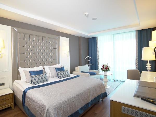 Sueno Hotels Deluxe Belek : photo 2 de la chambre chambre de luxe - vue sur terres et golf