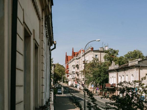 Apartamenty Browar Perła - Perła Brewery Apartments : photo 4 de la chambre appartement avec balcon