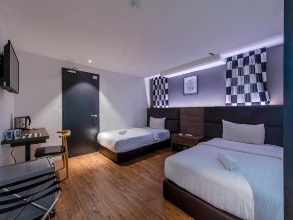 Stella Hotel - Johor Bahru : photo 2 de la chambre chambre lits jumeaux deluxe