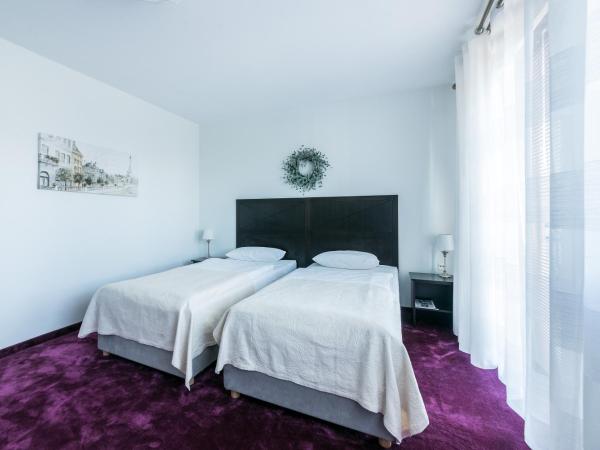 Villa Gdynia : photo 8 de la chambre chambre triple standard