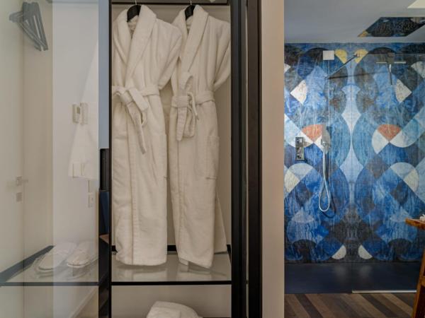 WALLURE - Tickled Hotel & Wellness : photo 5 de la chambre chambre deluxe - vue sur ville