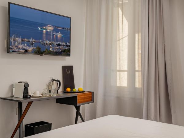 WALLURE - Tickled Hotel & Wellness : photo 6 de la chambre chambre deluxe - vue sur ville