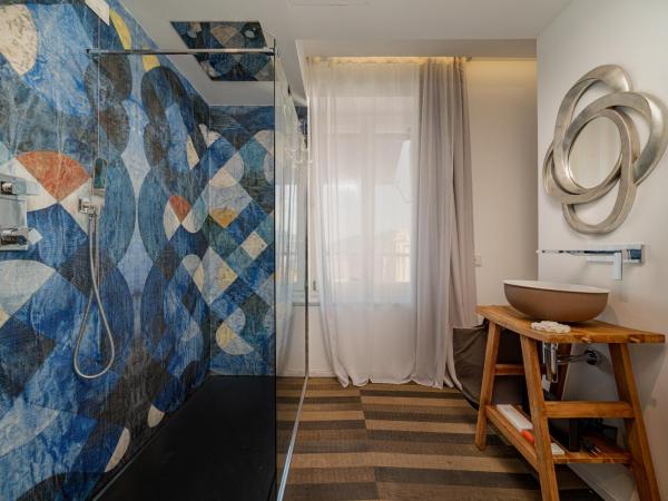WALLURE - Tickled Hotel & Wellness : photo 10 de la chambre chambre deluxe - vue sur ville
