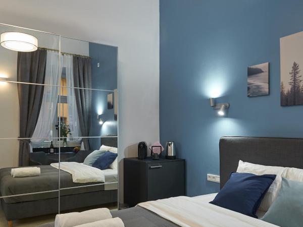 7 HEAVEN Elegant Rooms KRAKÓW Old Town : photo 5 de la chambre chambre double avec salle de bains privative