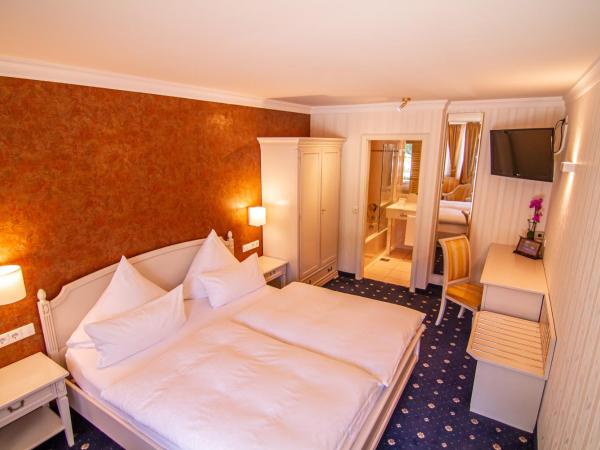 Zur Weinsteige : photo 7 de la chambre chambre double confort dépendance