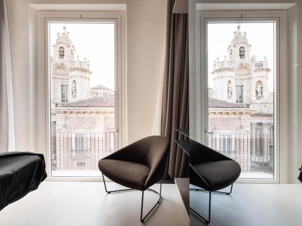 Meo Design Suites & Spa : photo 3 de la chambre chambre lit king-size - vue sur montagne