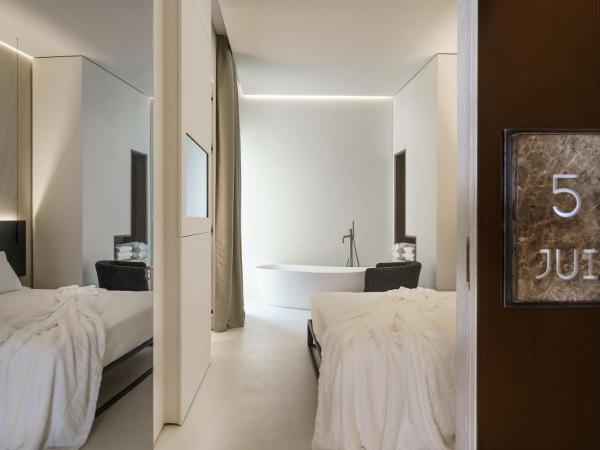 Meo Design Suites & Spa : photo 9 de la chambre chambre double deluxe avec baignoire