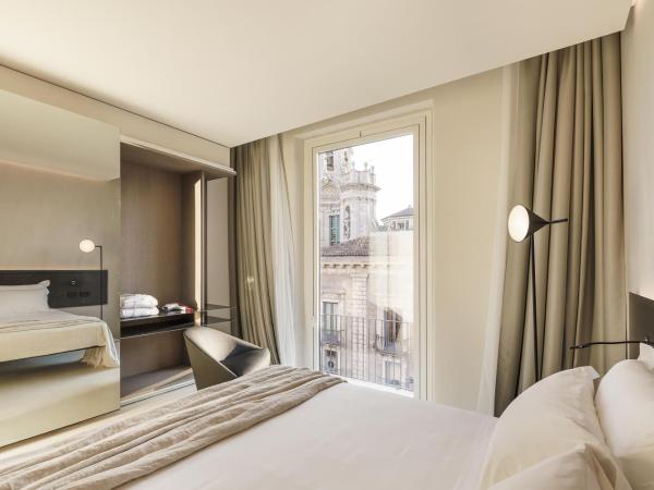 Meo Design Suites & Spa : photo 10 de la chambre chambre lit king-size - vue sur montagne