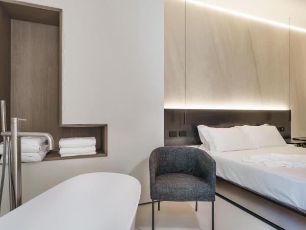 Meo Design Suites & Spa : photo 10 de la chambre chambre double deluxe avec baignoire