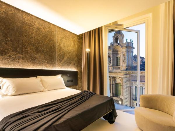 Meo Design Suites & Spa : photo 3 de la chambre chambre lit king-size - vue sur montagne