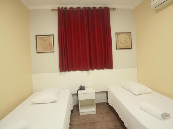 Campos Gerais Hotel : photo 3 de la chambre chambre lits jumeaux deluxe